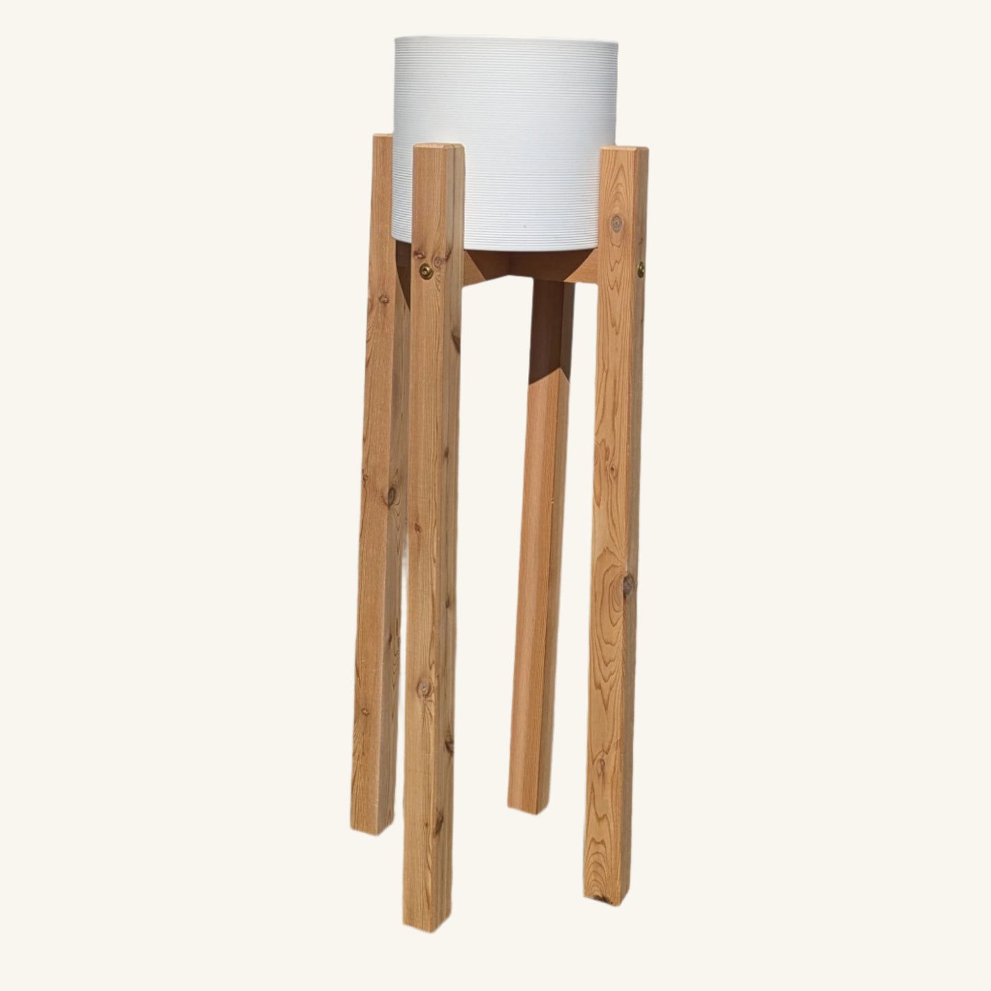 Side view of 24-inch elevated cedar plant stand with ceramic pot, highlighting vertical leg design and sturdy base construction.