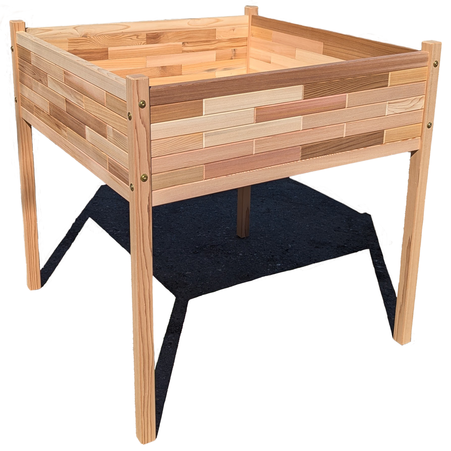 Angled corner view of large raised cedar planter box highlighting sturdy construction, elevated design, and handcrafted wood detailing from Kelowna Woodcraft.