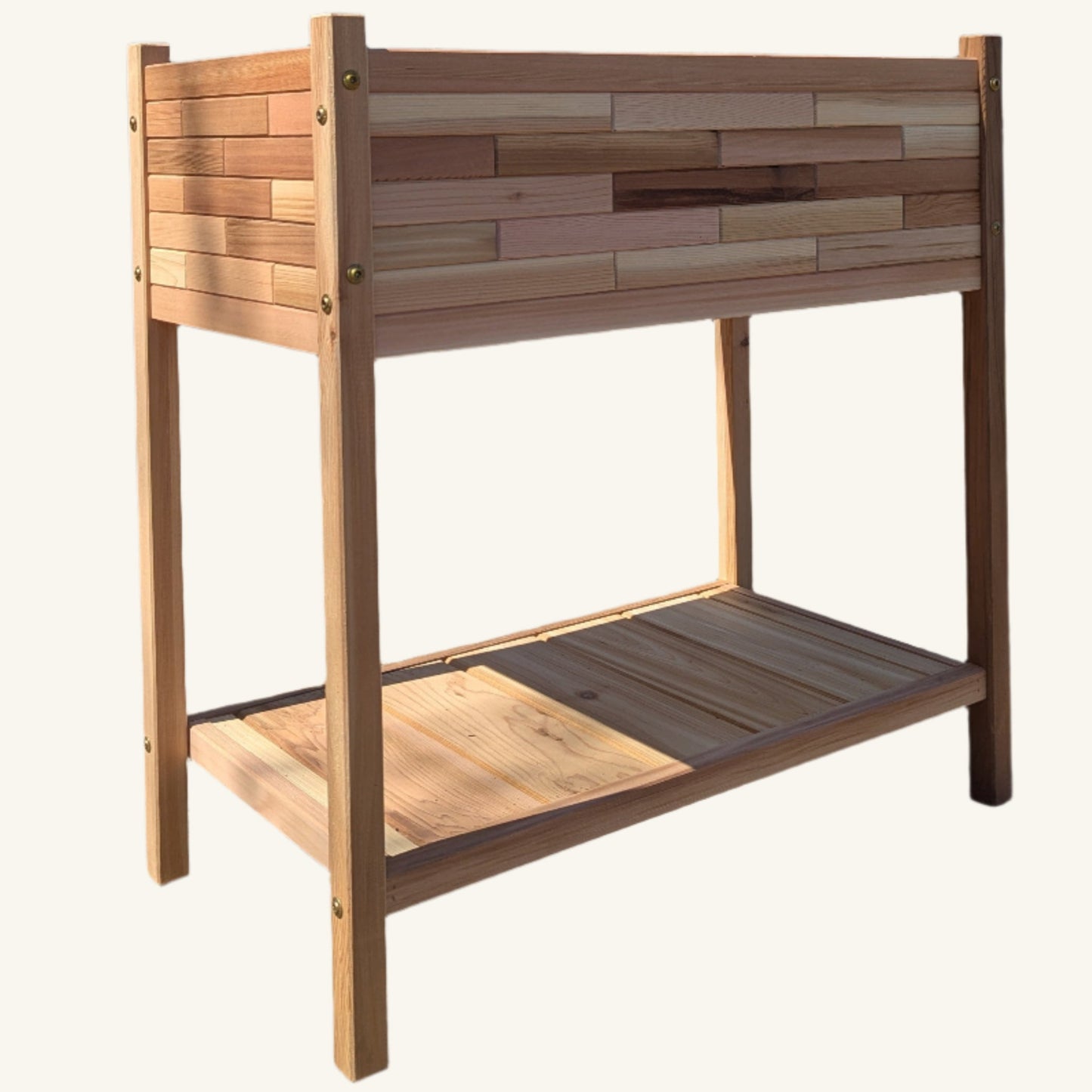 Three-quarter view of Kelowna Woodcraft handcrafted raised cedar garden planter, 33 inches wide with functional shelf and modern silhouette.