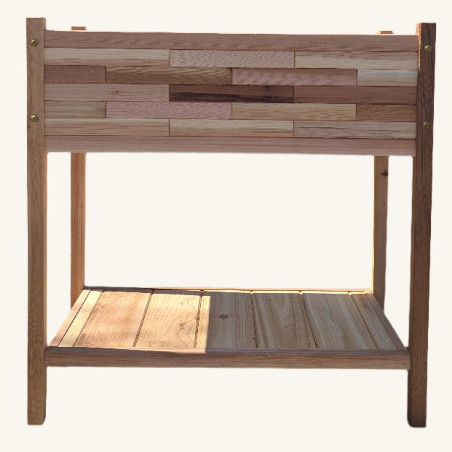 Side angle of Kelowna Woodcraft raised cedar planter box showing 33 inch length and built-in lower shelf for garden tools or decor.
