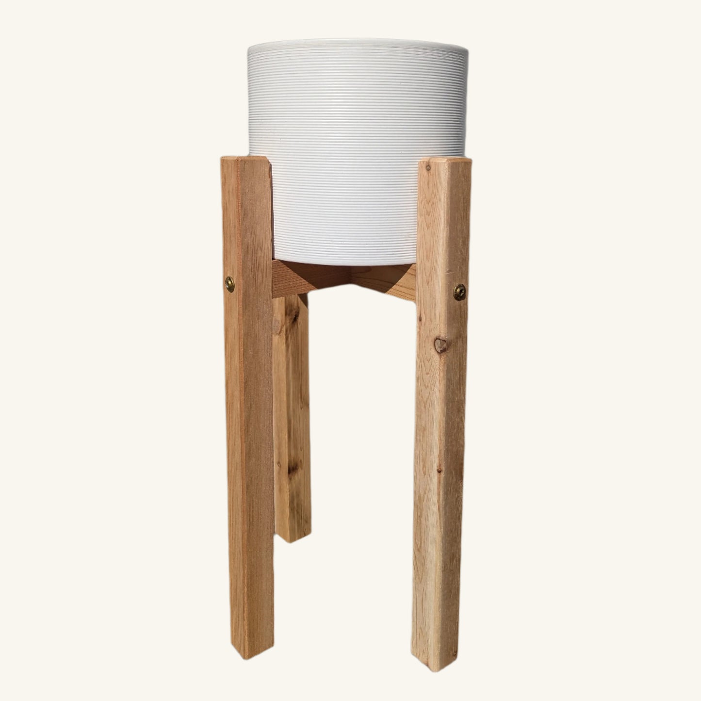Side profile of 16-inch tall stand with ceramic pot in handcrafted cedar stand, highlighting minimalist frame and natural wood grain.