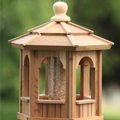 Close-up of 12-inch cedar bird feeder highlighting natural wood grain and precision joinery, handcrafted in BC from Western Red Cedar by Kelowna Woodcraft.