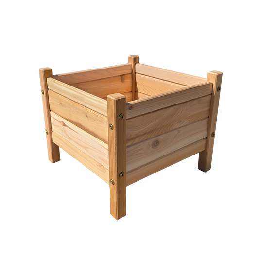 Angled corner view of handcrafted cedar planter box, 17x17 inches, standing 14 inches tall with precision tongue and groove joints.