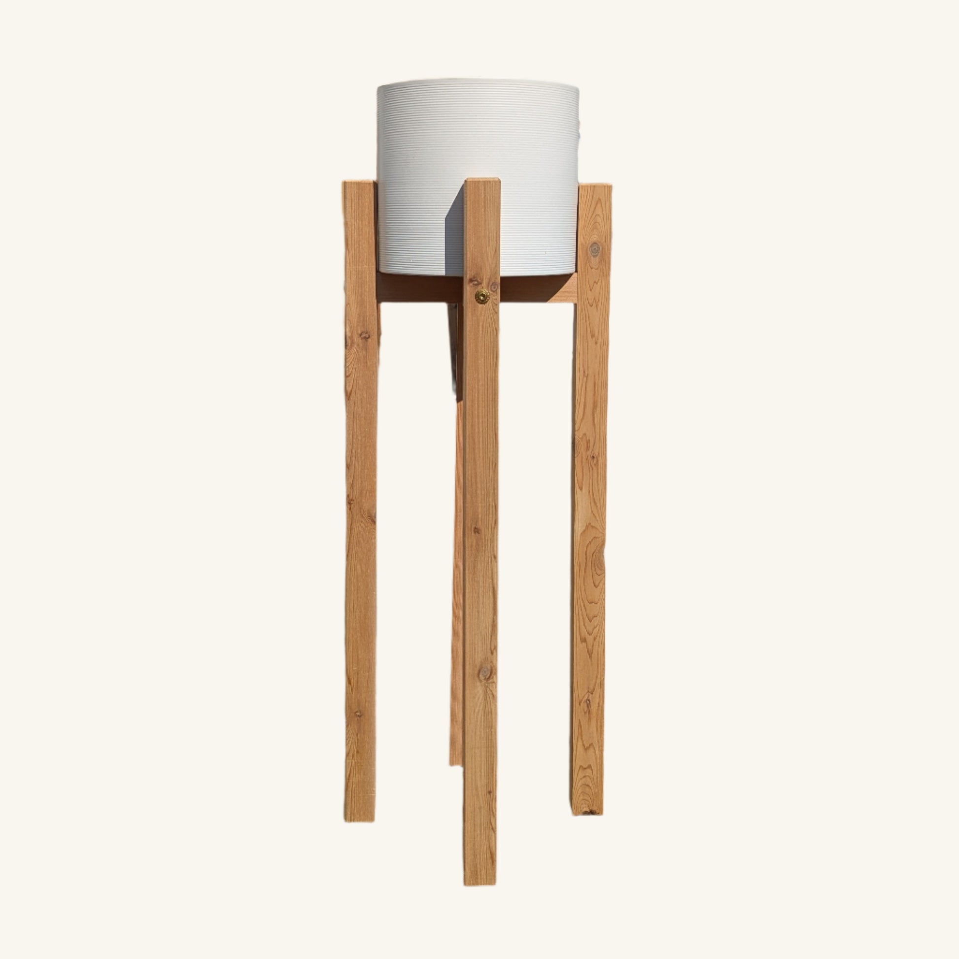 24-inch tall cedar plant stand with high-quality white ceramic pot, handcrafted from sustainable BC Western Red Cedar, modern and minimalist design by Kelowna Woodcraft.