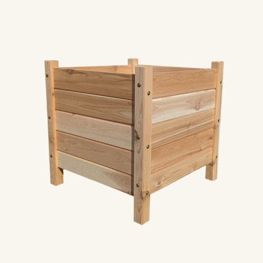 Front view of Kelowna Woodcraft 18 inch square garden box made from solid BC cedar, standing 18 inches tall with classic panel design.