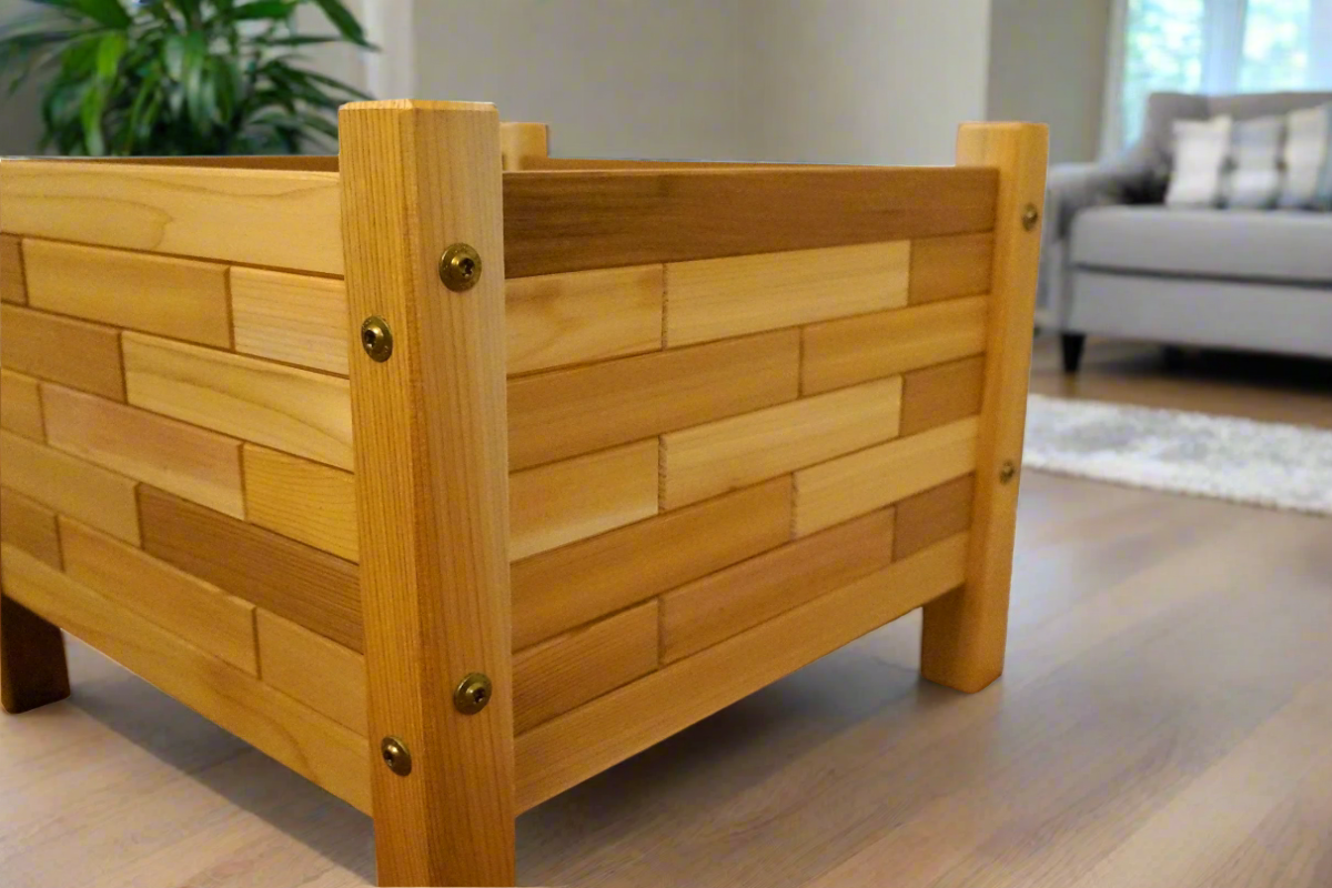 Close-up of 17x17 cedar planter box showing alternating brick pattern and fine Western Red Cedar grain, handmade by Kelowna Woodcraft in British Columbia.